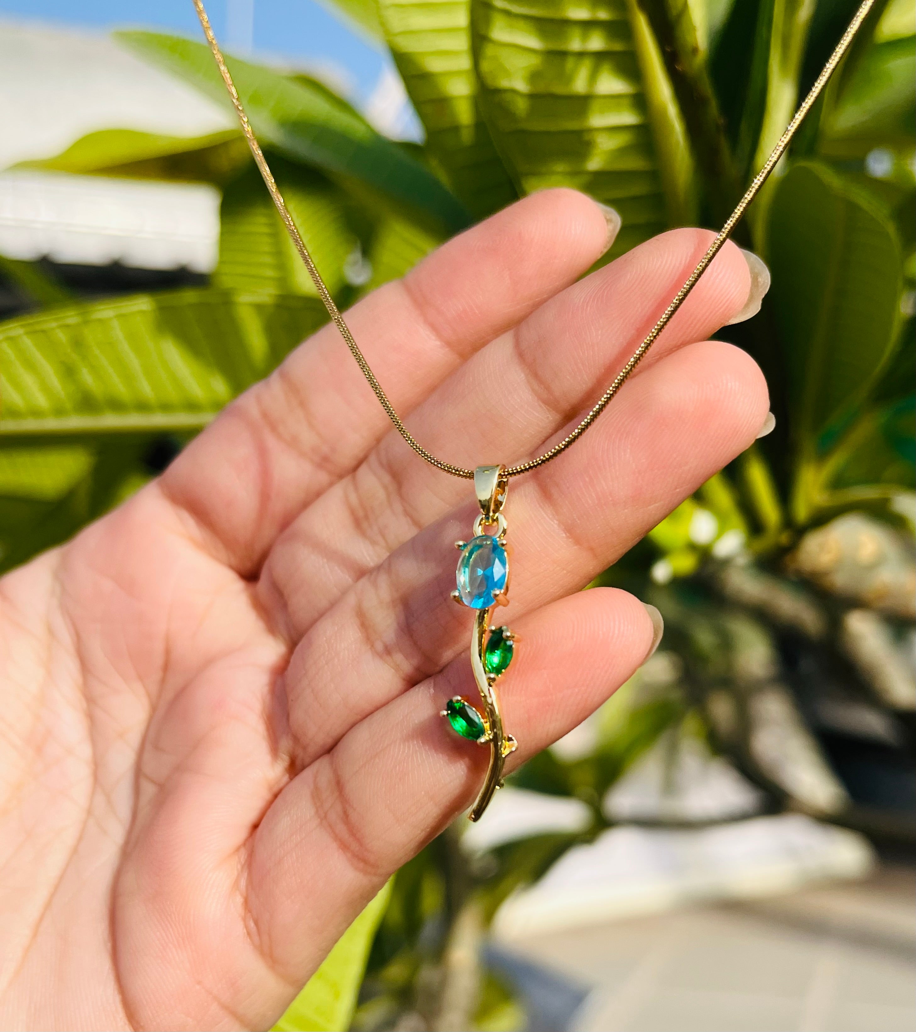 Blue Crystal tulip Pendant with Emerald Green Leaves - Gold Plated