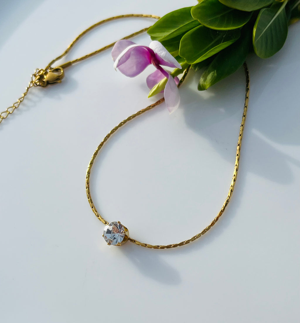 Dainty white stone pendent