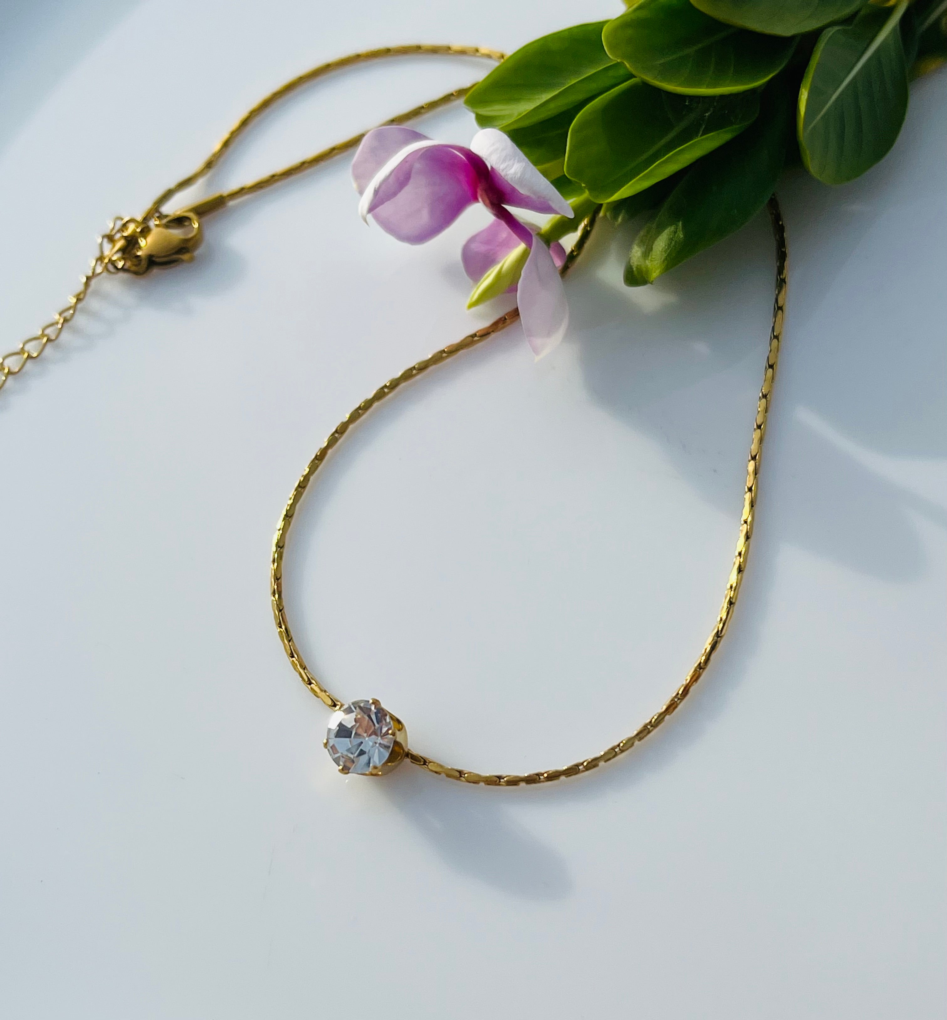 Dainty white stone pendent