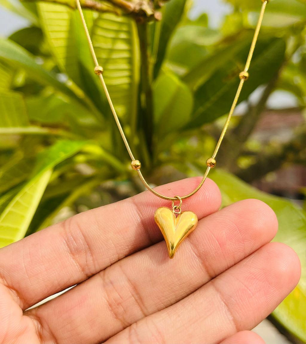 Dented Heart shaped pendent