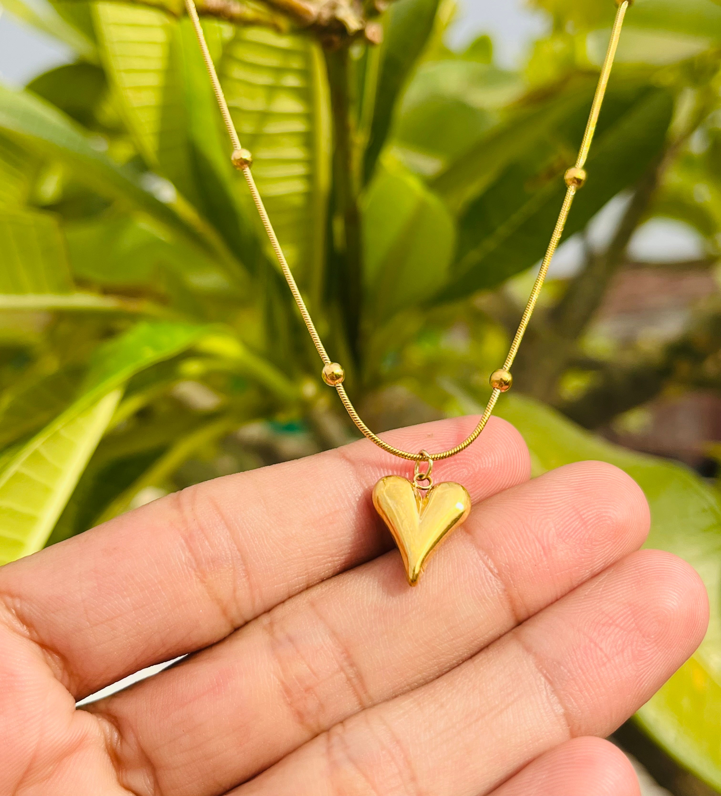 Dented Heart shaped pendent