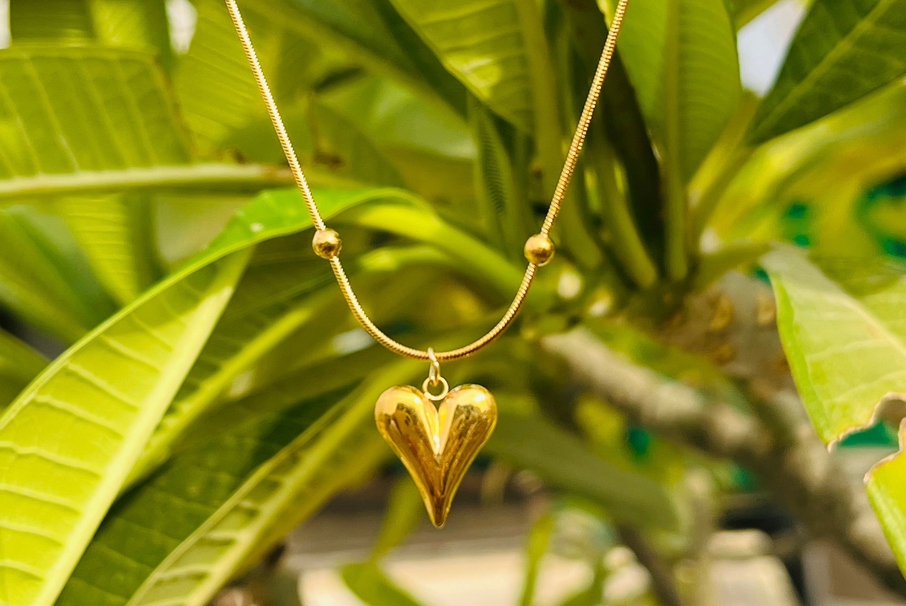 Dented Heart shaped pendent