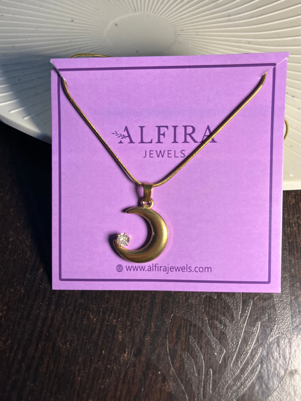 Crescent moon pendent