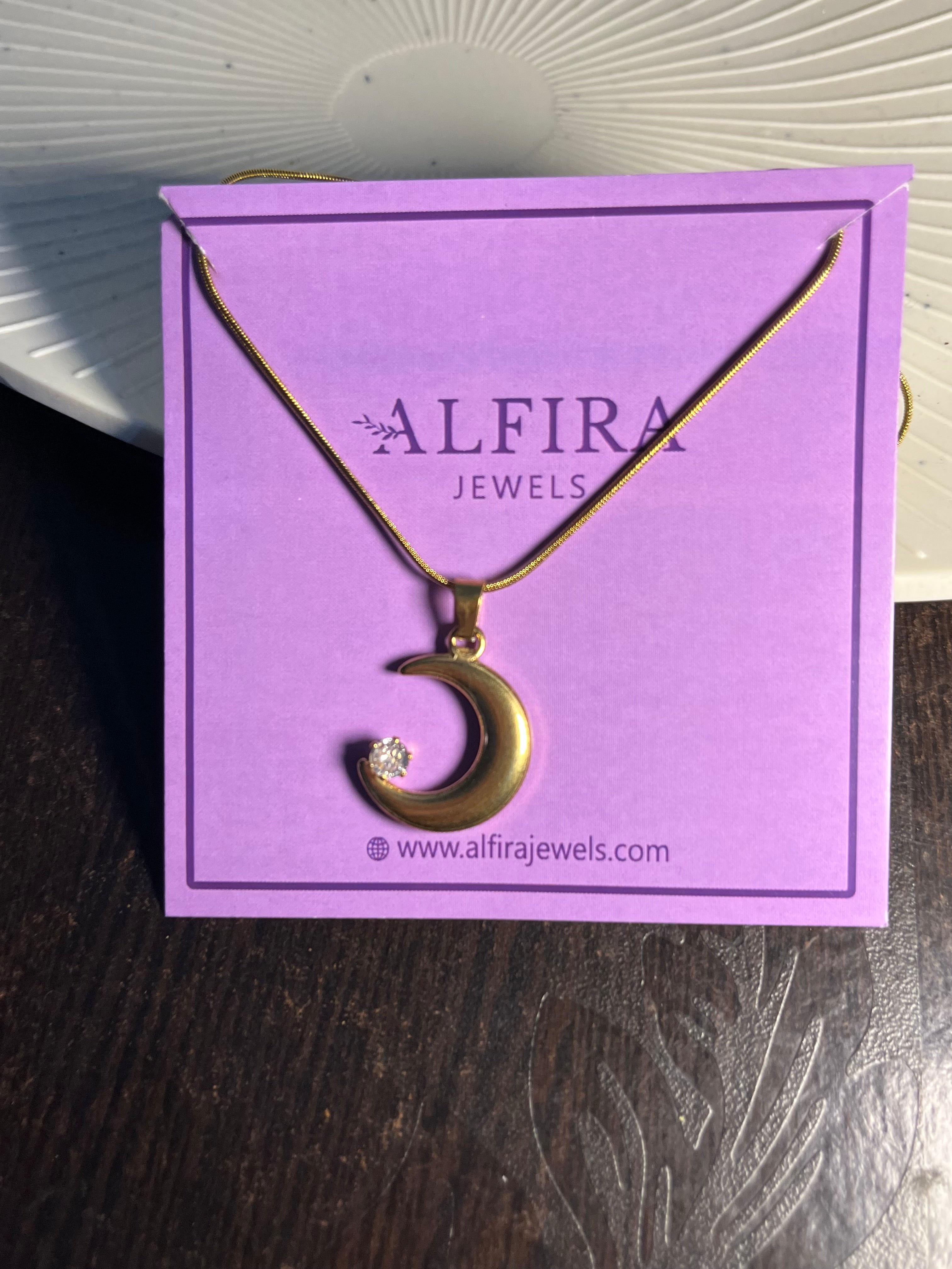 Crescent moon pendent