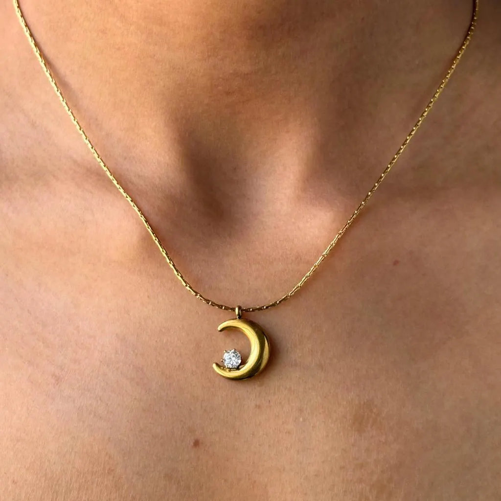 Crescent moon pendent
